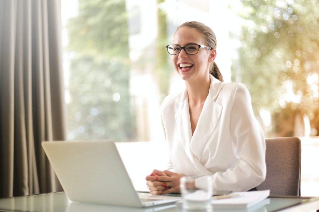 Woman happy using accounting software